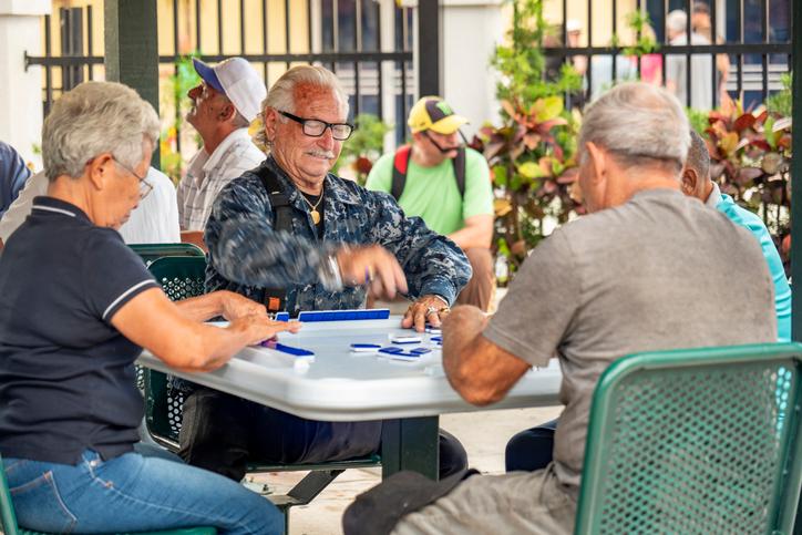 old Cuban men playing outside in Florida